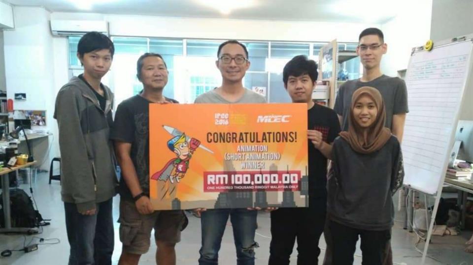 Animation team holding a short animation grant award
